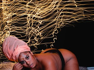 Fotografie a profilului african-doll